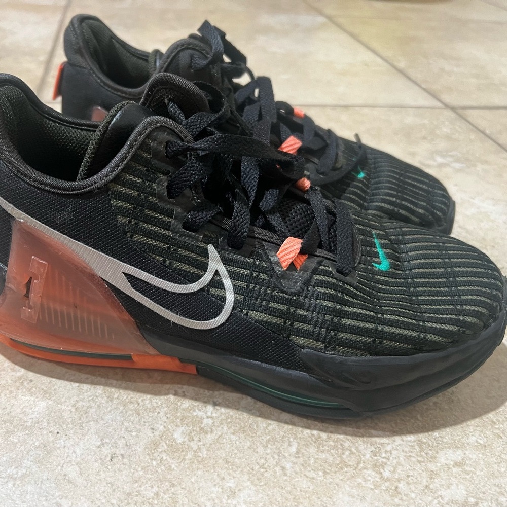 Nike Black and Orange Sneakers with Breathable Fabric and Chunky Heel